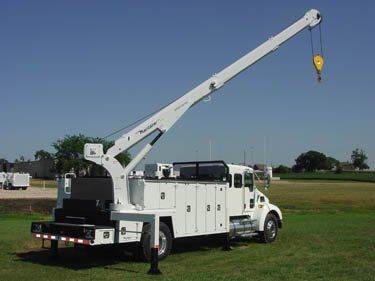 A Maintainer 2 Ton Body with a 12,000lb crane