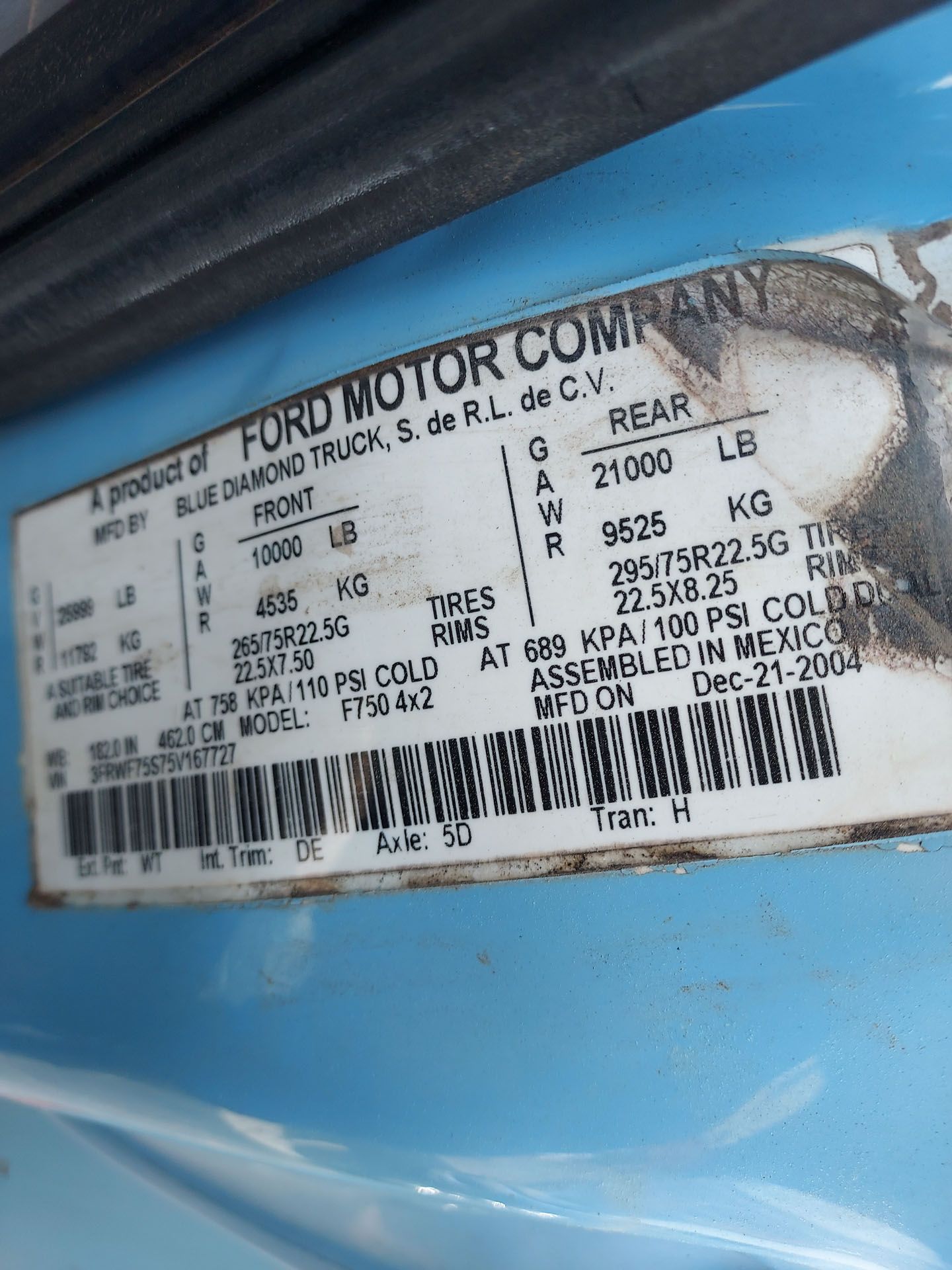 A close up of a ford motor company sticker on a car