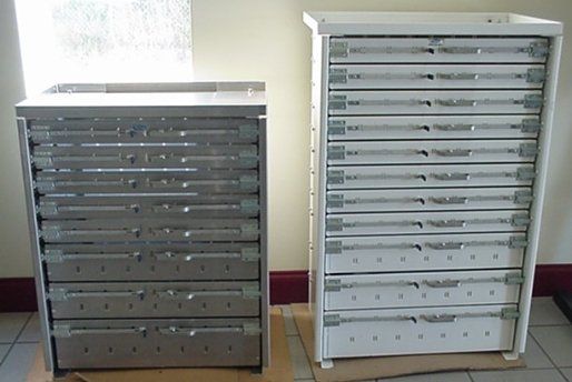 Two dressers are sitting next to each other in a room