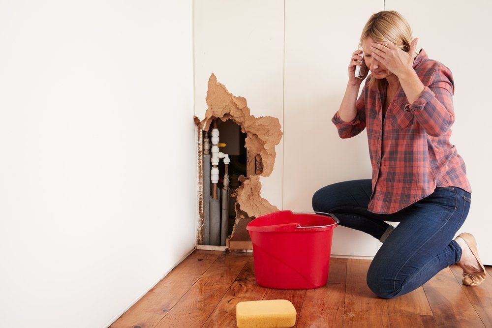 Woman Calling for Help - Plumbing Services in Goonellabah, NSW