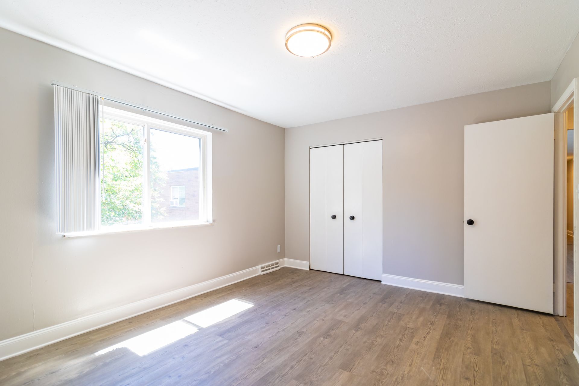 There is a large window in the middle of the room.