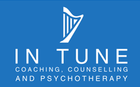 A blue logo for in tune coaching counselling and psychotherapy