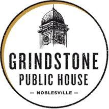 Logo for Grindstone Public House in Noblesville, featuring a building tower inside a gold-rimmed circle.