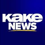 KAKE News logo in white text on a dark blue background with a yellow underline