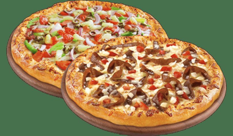 Two pizzas are sitting next to each other on a green background.