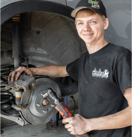 A man wearing a hat that says bmw on it | All-Star Automotive