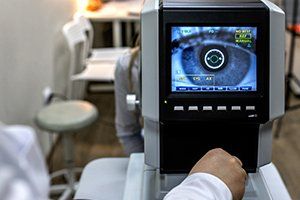 Eye Care Clinic — Optometrist Examining Female Patient in Durango, CO