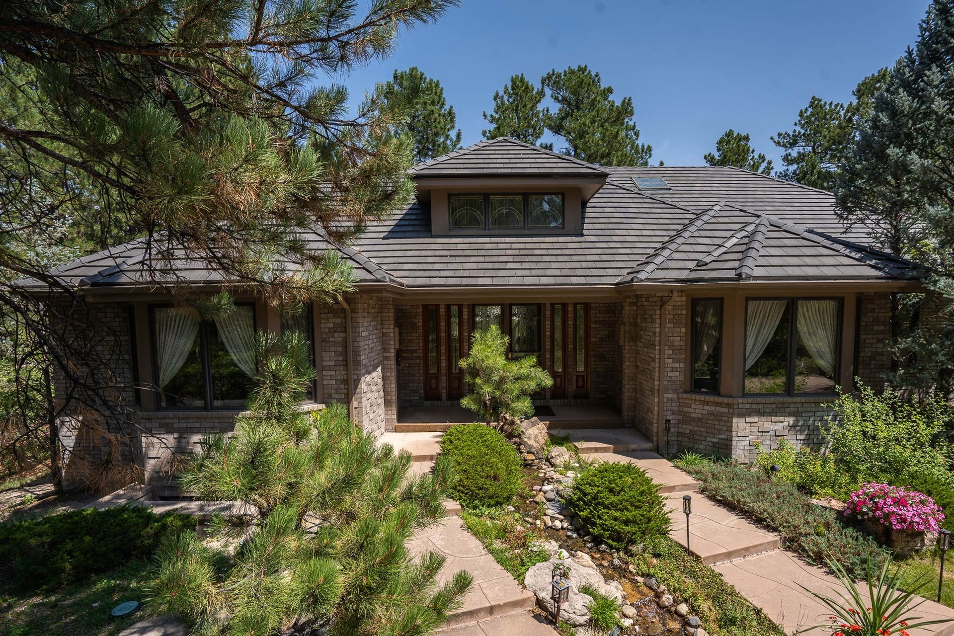 Local Roofing Contractor in Denver CO installing premium residential tile roofing system. Local Roofing Contractor in Denver CO installing premium residential tile roofing system.