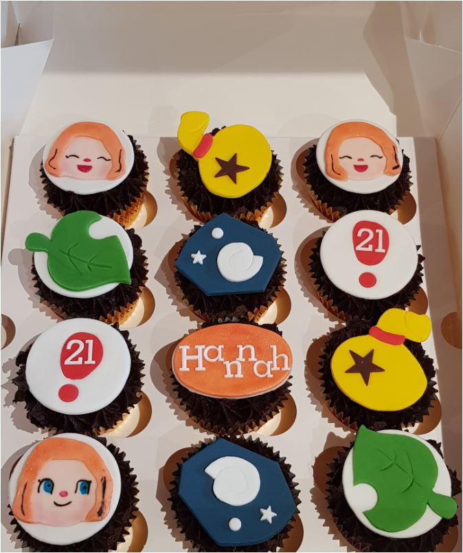 A box of animal crossing cupcakes with the number 21 on them