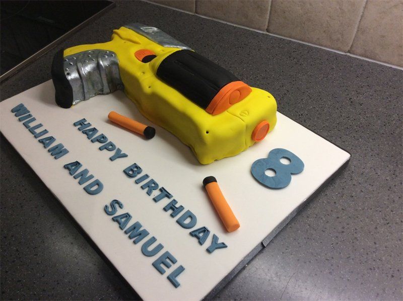 Yellow nerf gun cake