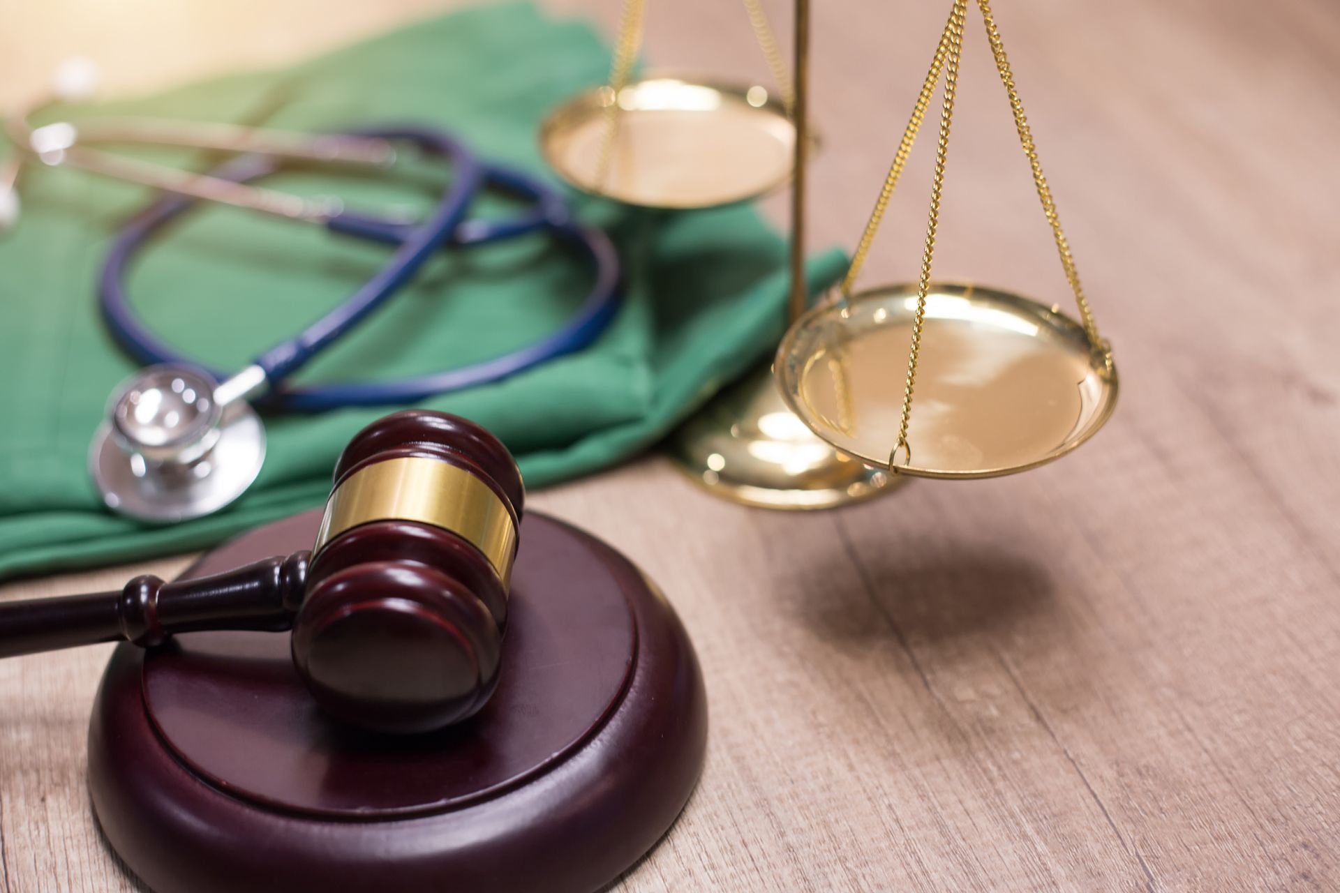 Gavel and stethoscope in background. Medical laws and legal concept