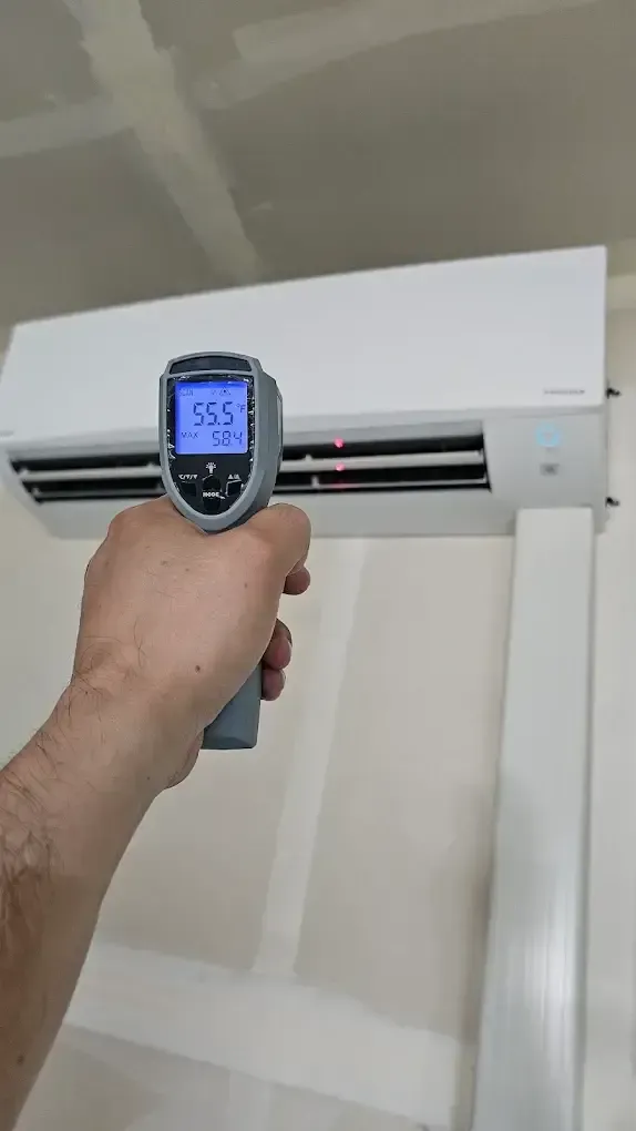 HVAC technician providing indoor air quality services