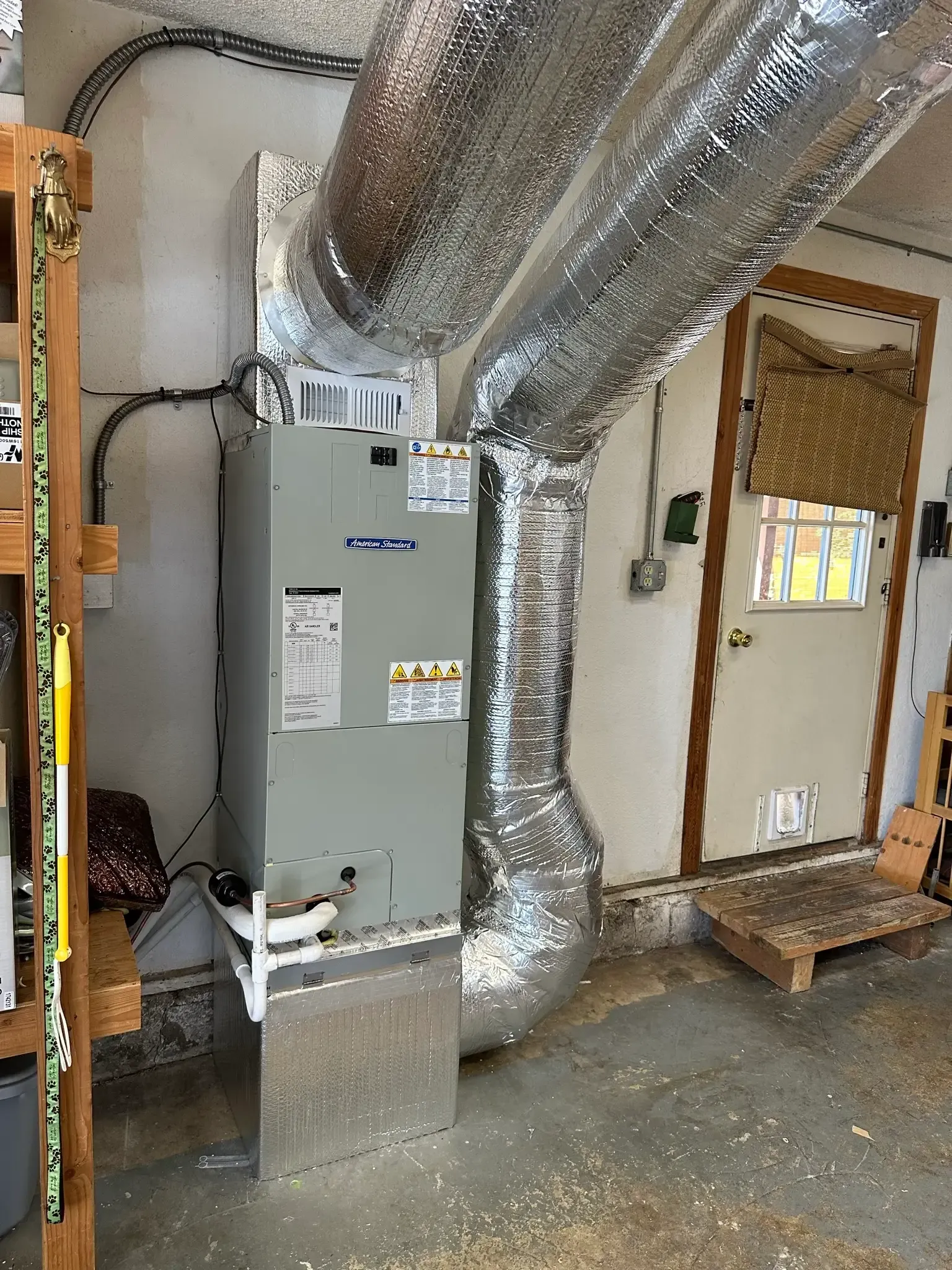 HVAC technician providing air conditioning installation services