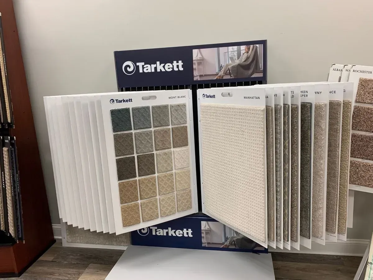 A display of carpet samples in a store.