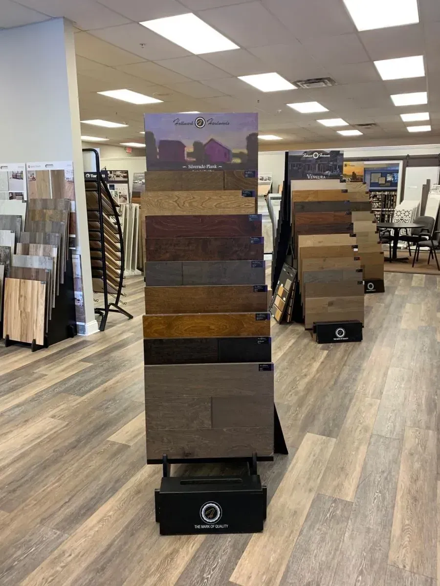 There are many different types of flooring on display in this store.