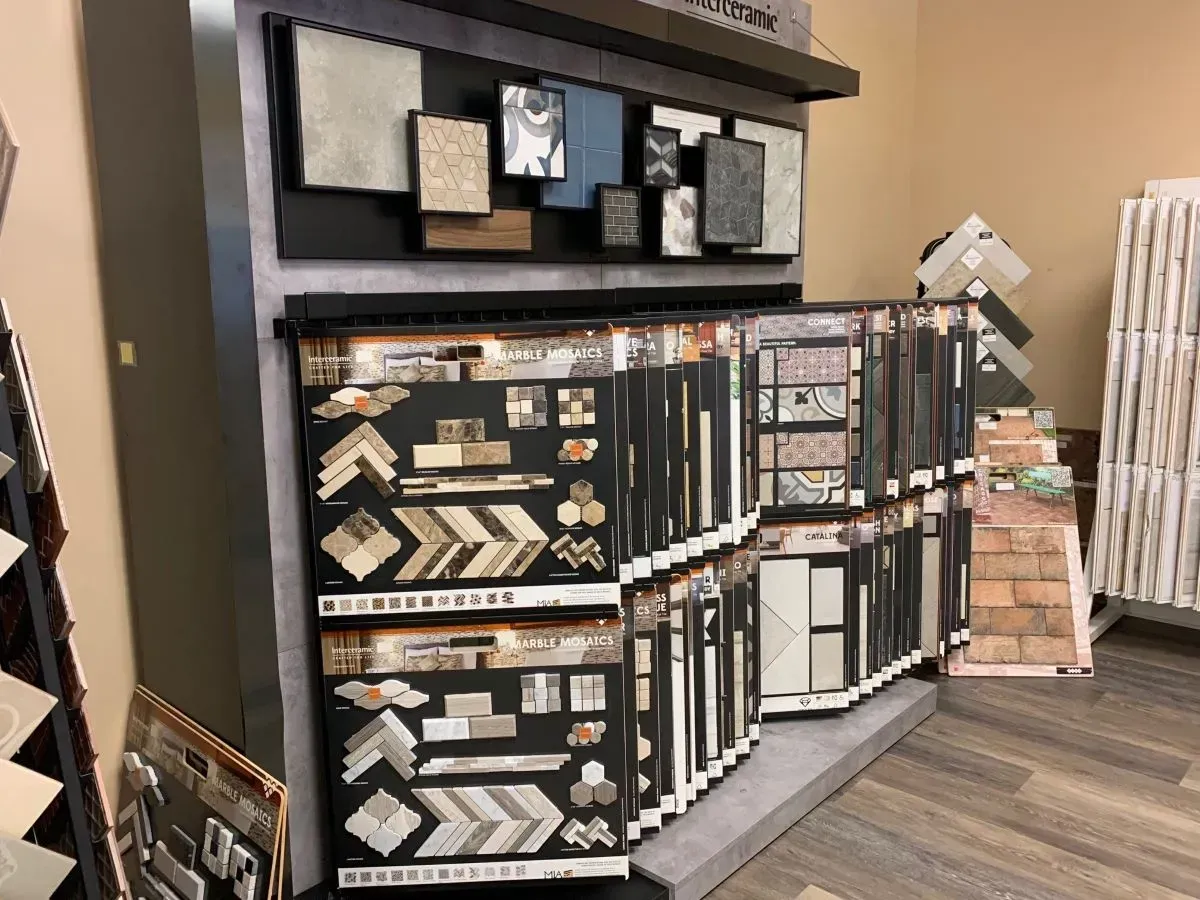 There are many different types of tiles on display in this store.