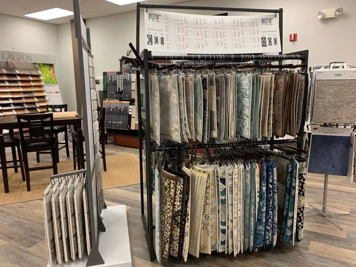 There are many different types of fabrics on display in this room.