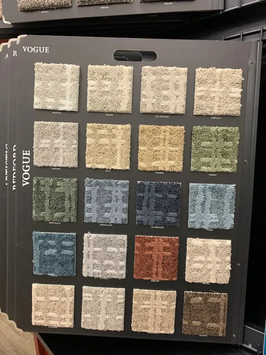 A vogue carpet swatch with many different colors