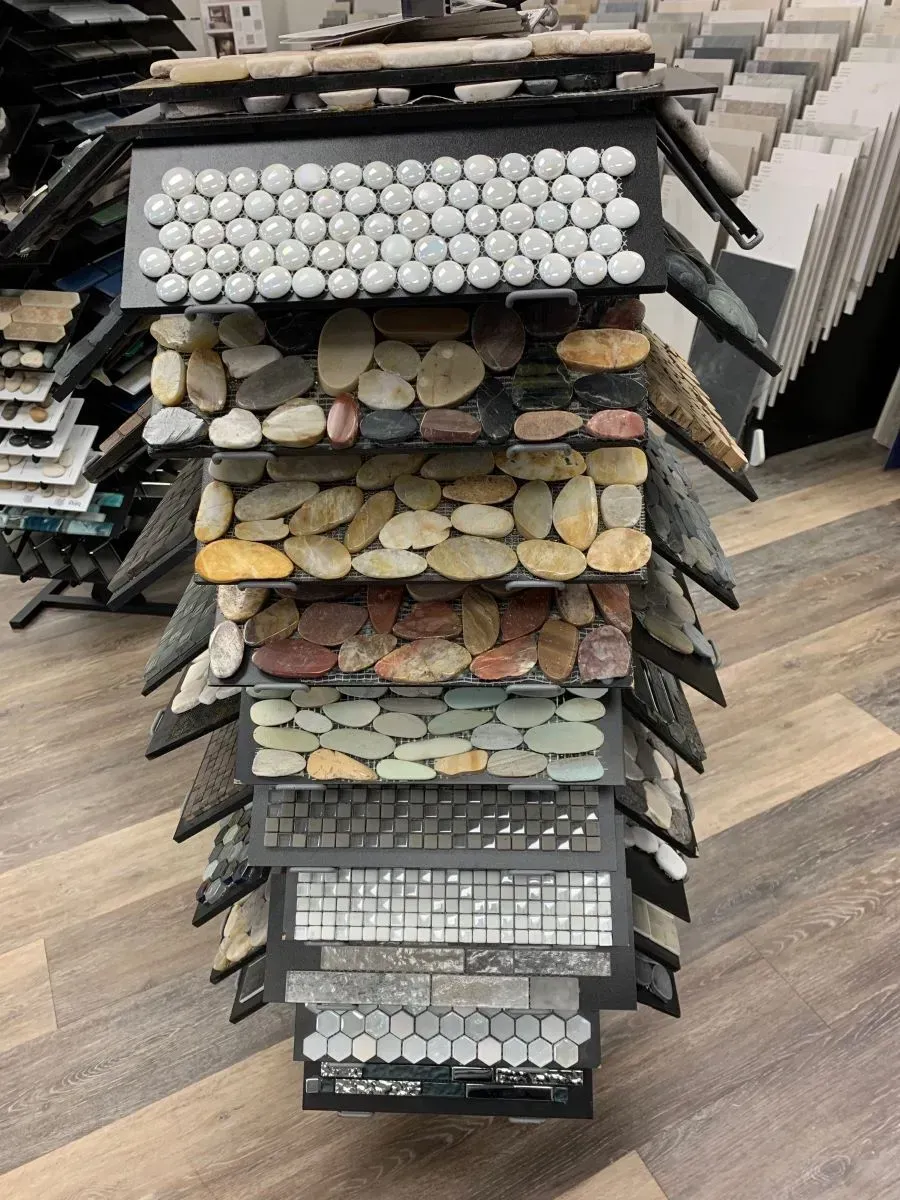 A display of different types of tiles and rocks in a store.