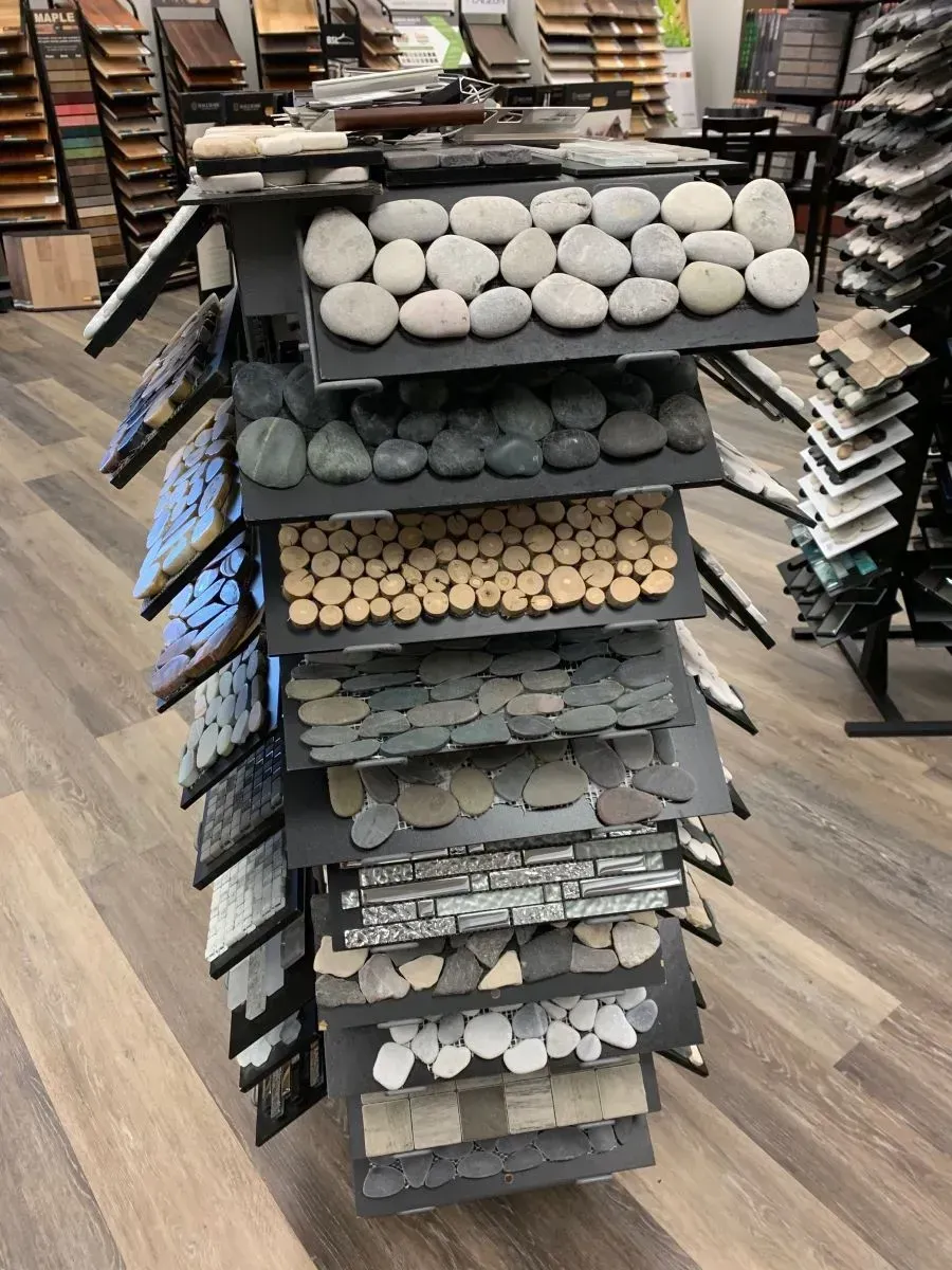 A display of different types of rocks in a store.