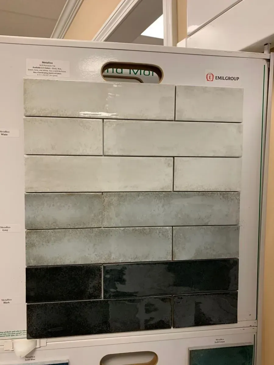 A white board with a bunch of tiles on it
