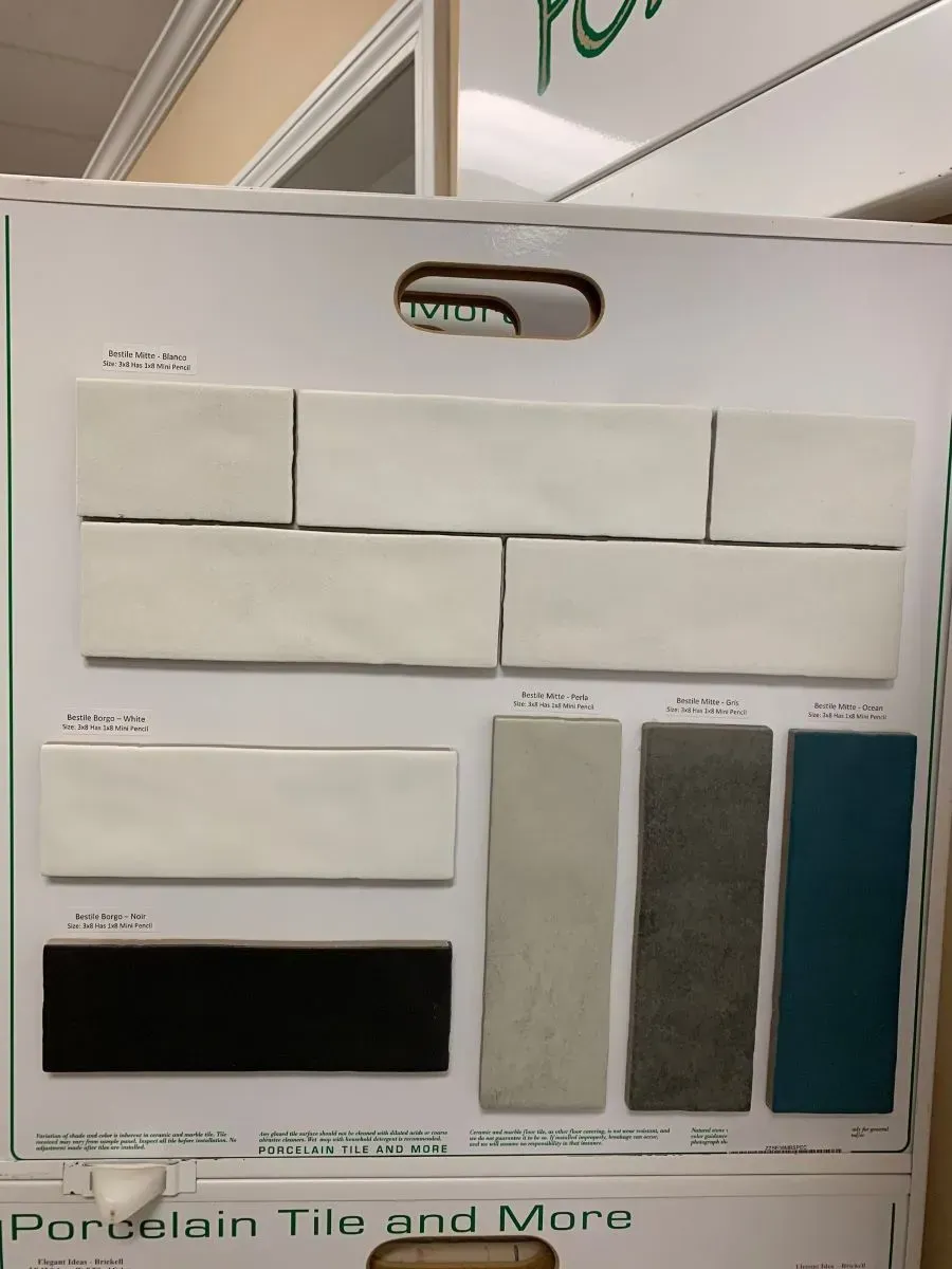 A porcelain tile and more display board with a handle