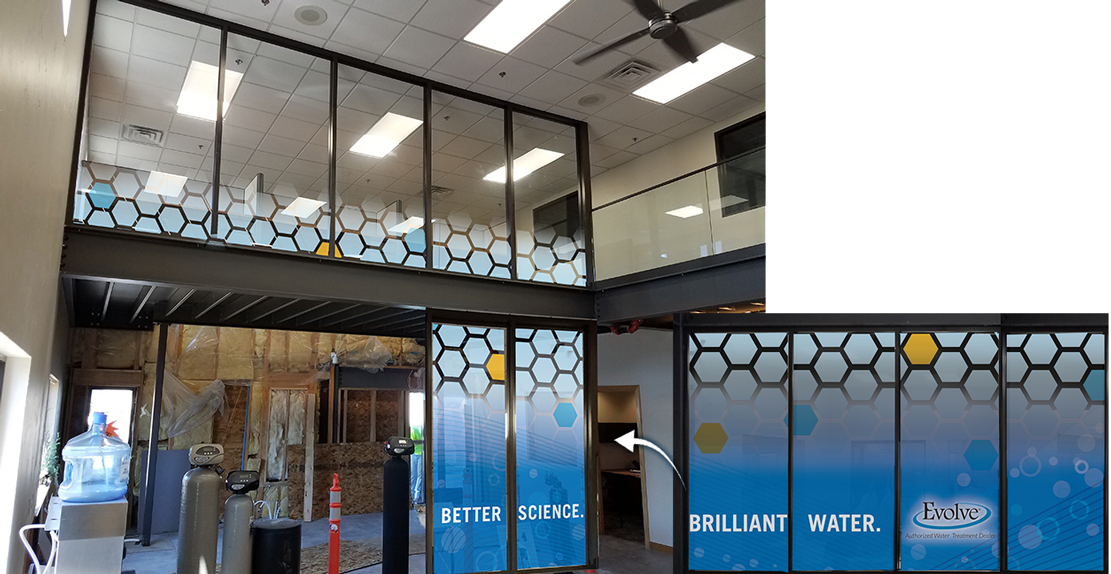 A picture of a building with a sign that says brilliant water