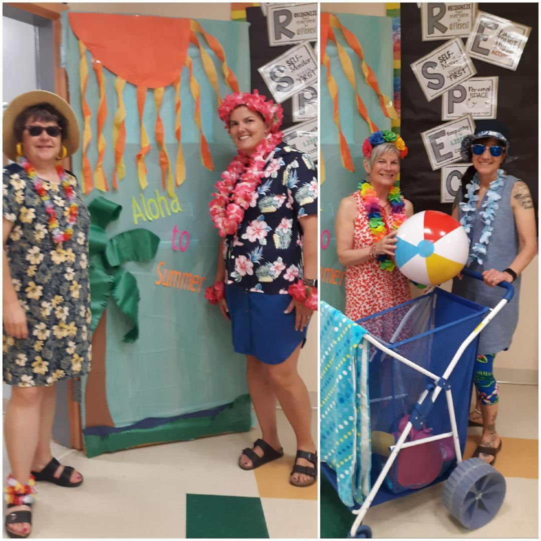 A group of women dressed up in hawaiian outfits