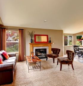 Open plan design for living room with carpet floor