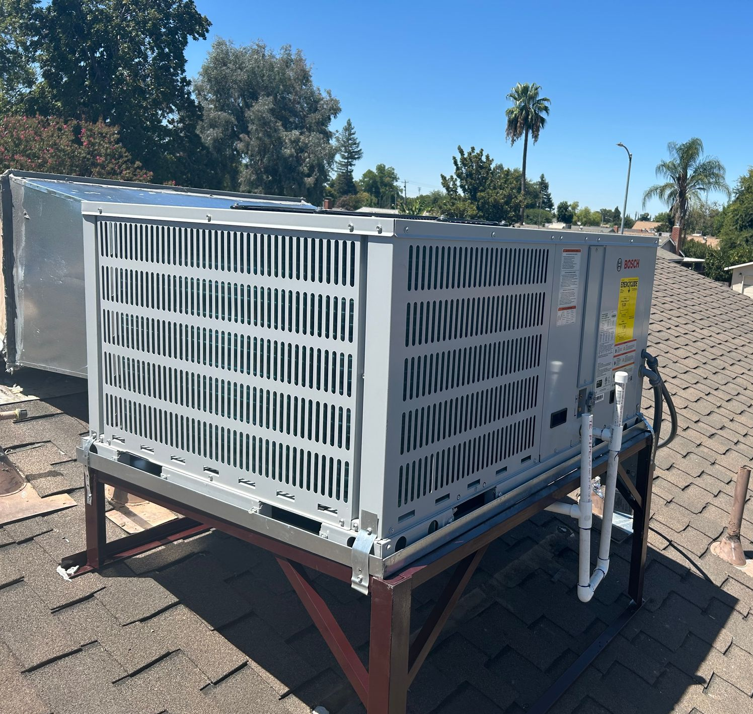 Worker Working on an Air Conditioner