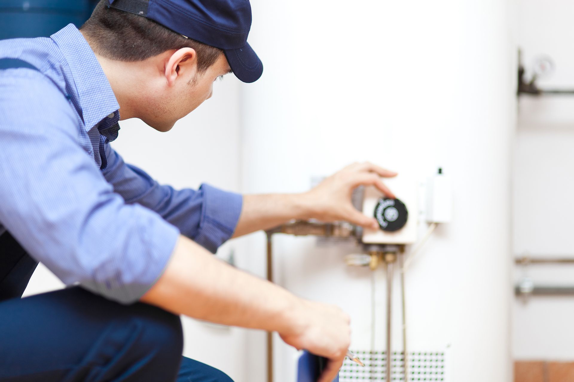 Man Working on Water Heater