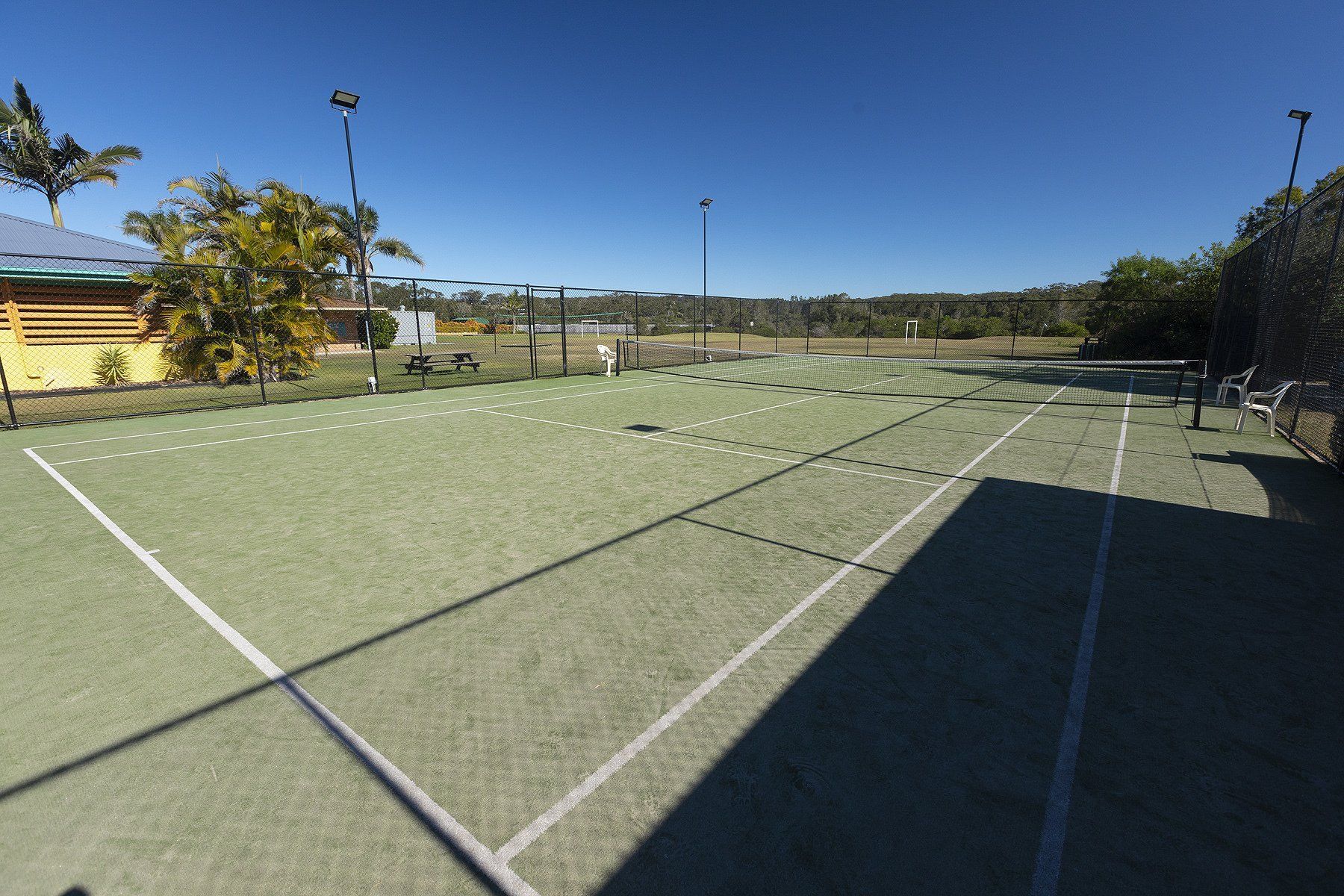tennis court on a bright day