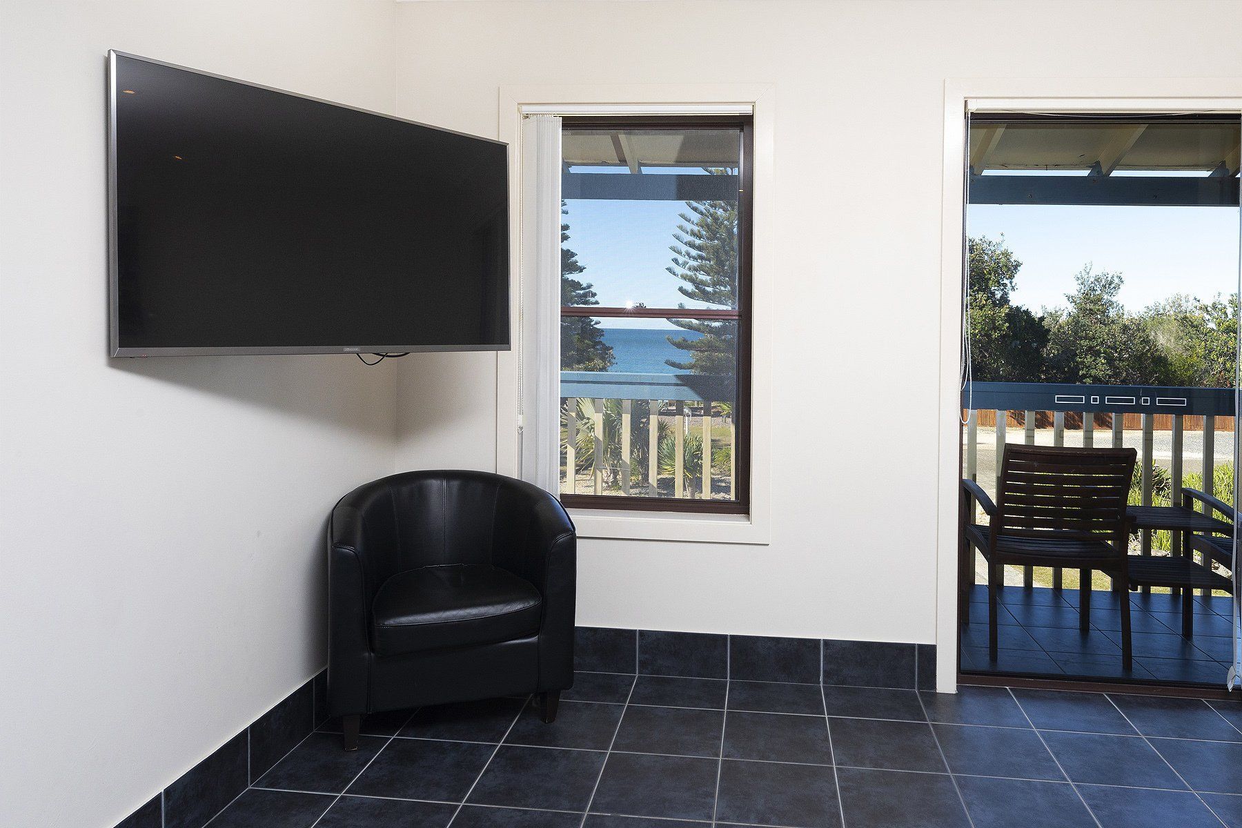 lounge chair near tv