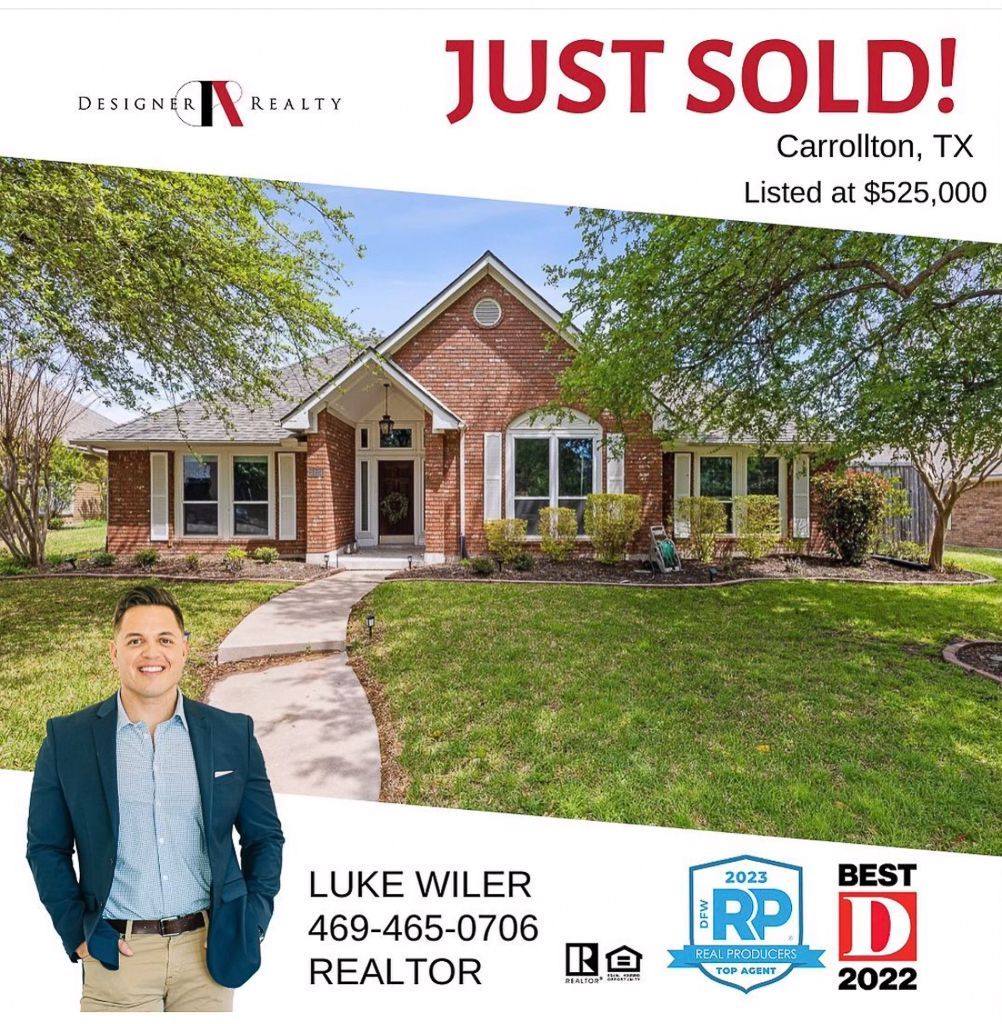 Luke Wiler is standing in front of a brick house that is just sold.