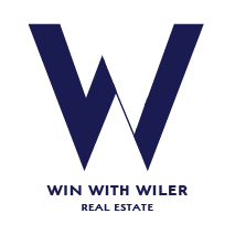 A blue logo for win with wiler real estate