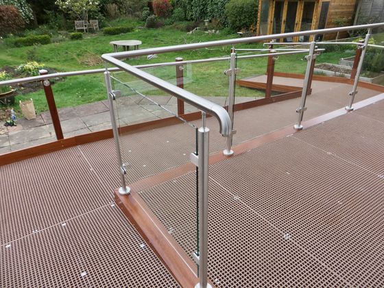 Wheelchair access ramp system with large decking area by Lymington Ramps