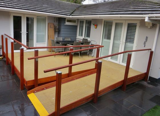 Wheelchair access ramp system with large decking area by Lymington Ramps