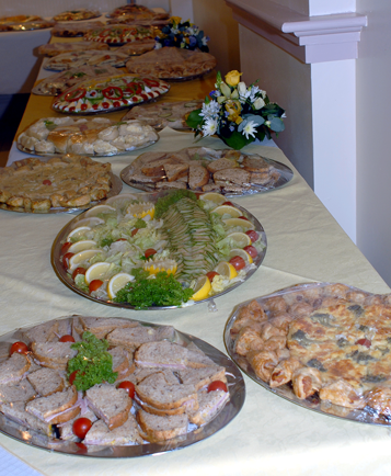 several buffet plates on a table