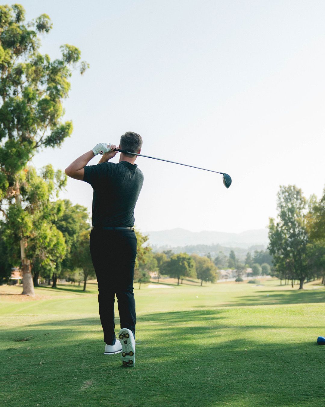 Woman Holding A Golf Club