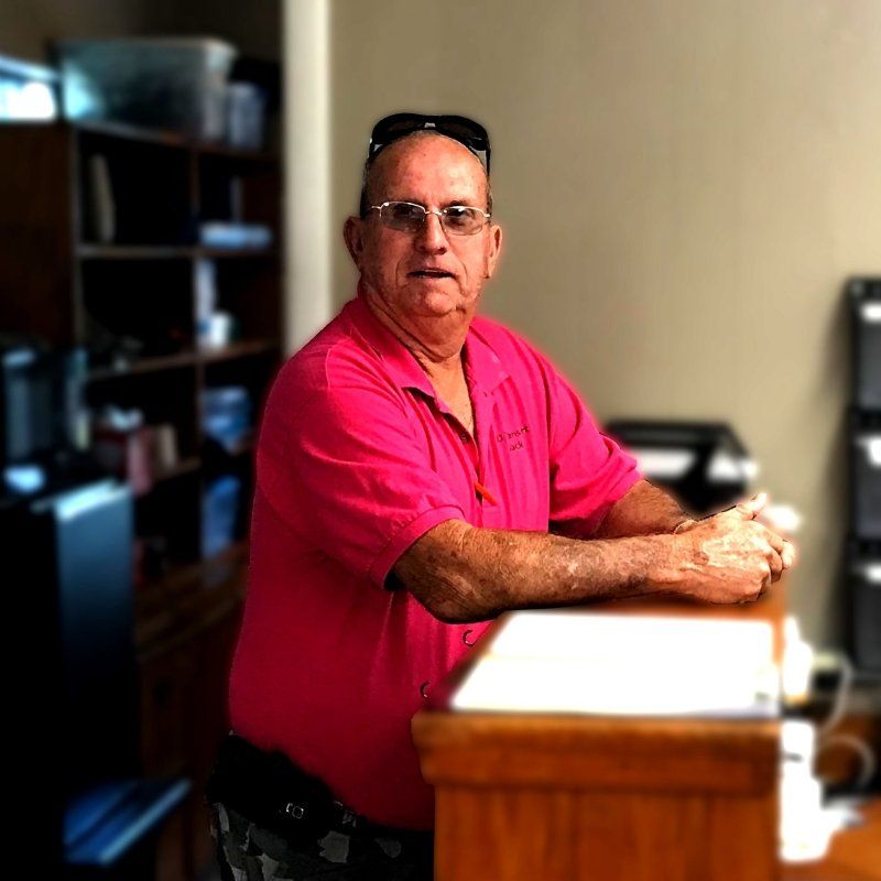 Professional in pink shirt at J J Transport of Arcadia Inc