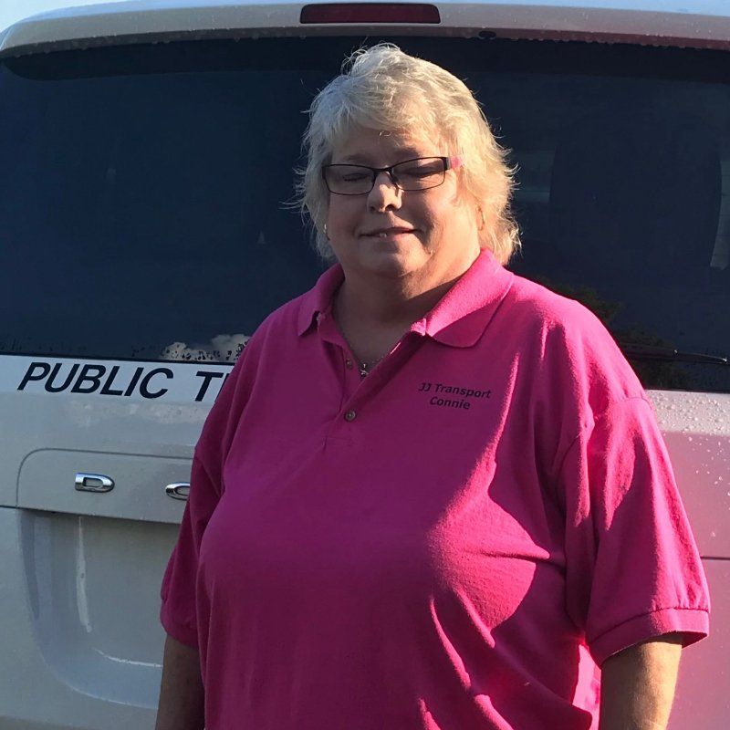 view of an old woman in pink t-shirt