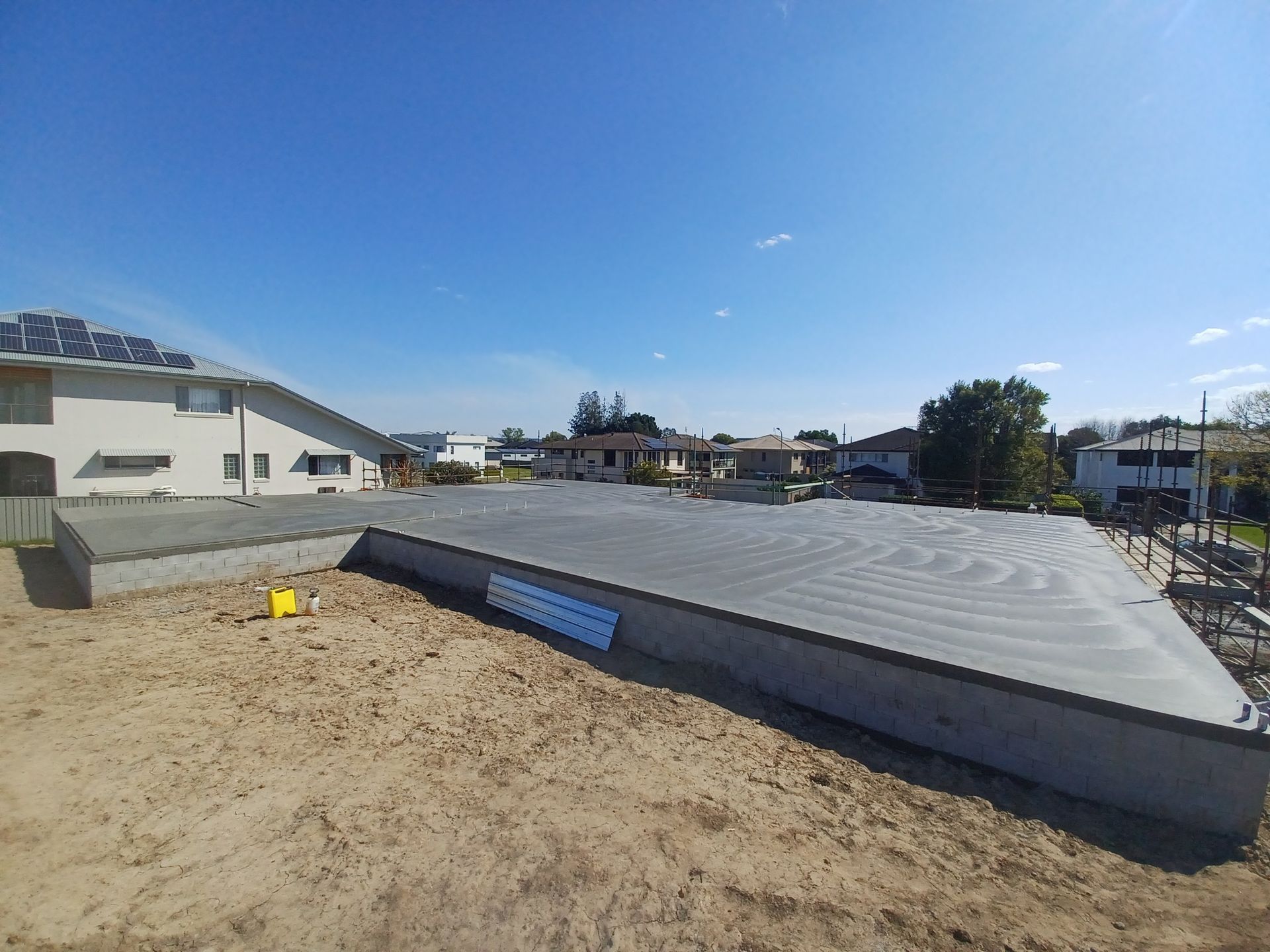 a newly laid concrete slab.— Brocksolid Concrete in Pillar Valley, NSW