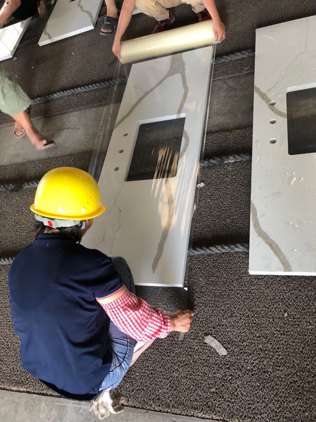 Carrillo Innovations team fabricating custom stone countertops for a commercial project in Las Vegas