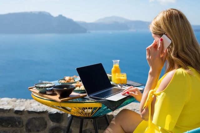 A photo of a lady on the phone representing that we service Cairns, Adelaide, Queensland, Victoria, New South Wales, Northern Territory, South Australia and Western Australia for all our web design, seo, lead generation & small business growth services.