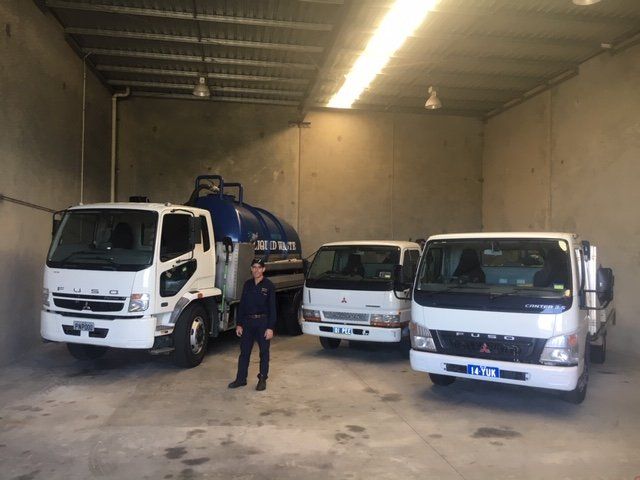 liquid waste truck fleet with driver