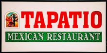 Sign for Tapatio Mexican Restaurant: red block letters, green text, logo of a figure in front of a landscape.