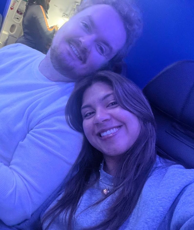 image of the creator of The Smart Packer with his wife sitting on an airplane