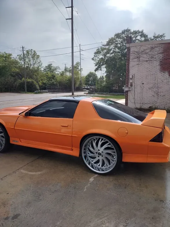Orange Car Outside the Shop — Montgomery, AL — LS World Window Tint