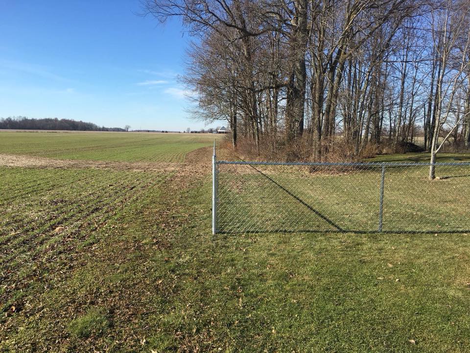 Installing Chain Link Fence in Open Field - Marion, OH - Tacketts Fence Service