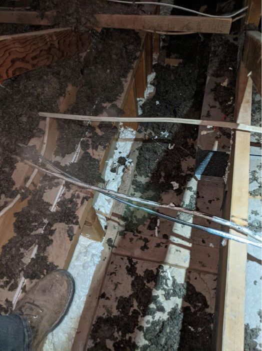 Open Wall Chases in drop soffit after technician sealed with foam. Phoenix, AZ